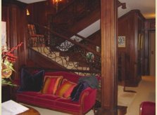 Sustainable mahogany (sapele) panelled hallway, stairs and lobby in an Iceland apartment